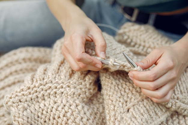 Free photo women sitting in a summer park and knitting