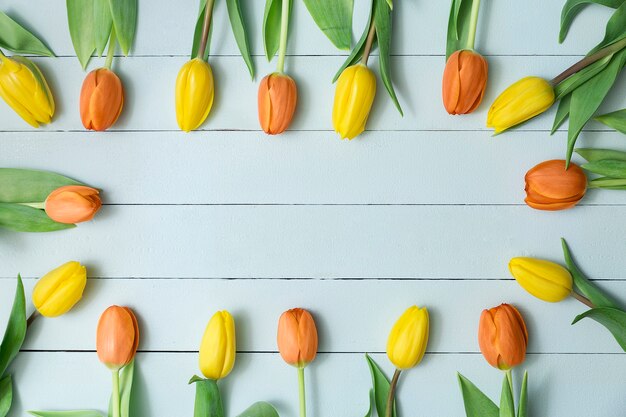 Wooden background with floral frame