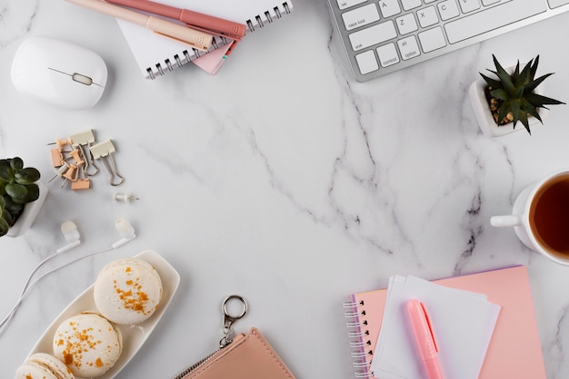 Free photo workplace items on marble table above view