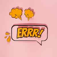 Free photo yellow lettering emotional text on speech bubble with elements on pink background