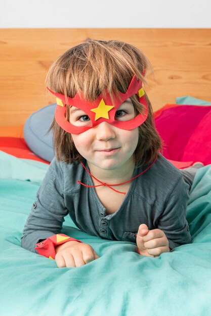 Young boy with costume playing