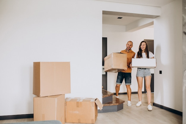 Free Photo young family moving into their new house