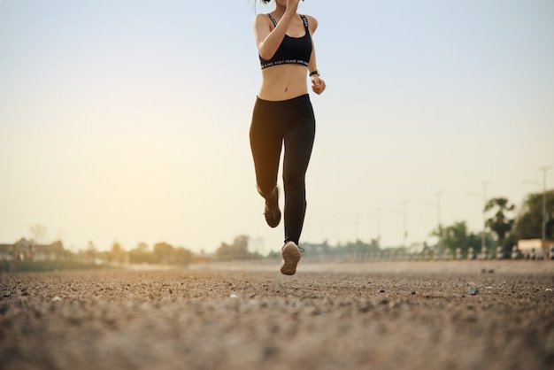 Free photo young fitness woman runner