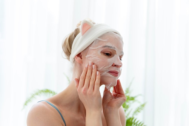 Free Photo young woman using a selfcare face mask