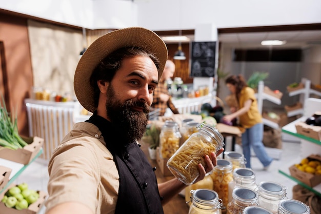 Free photo zero waste shop owner promotes store