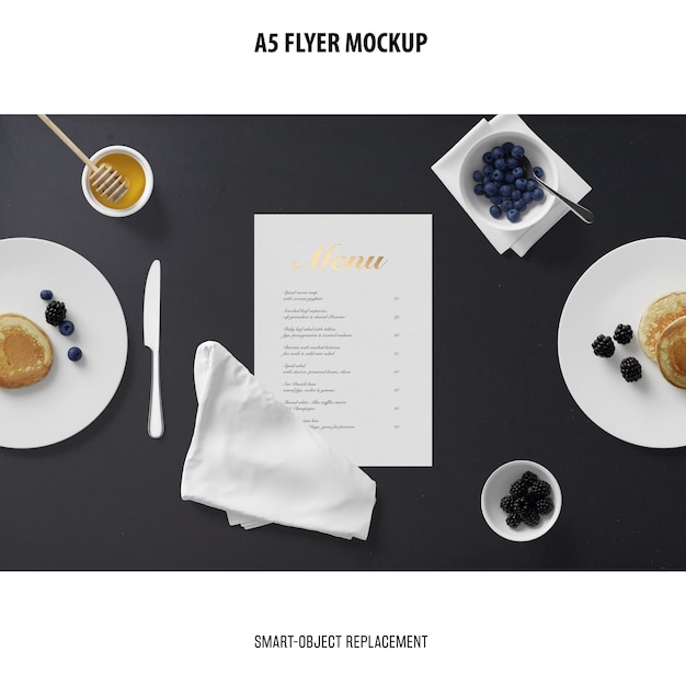 Free PSD flyer mockup in a desktop