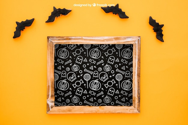 Free PSD halloween mockup with slate and bats