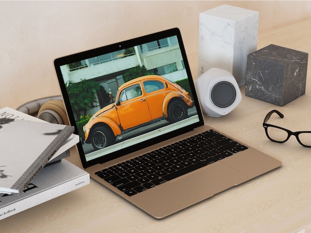 Free PSD laptop on desktop perspective mock up