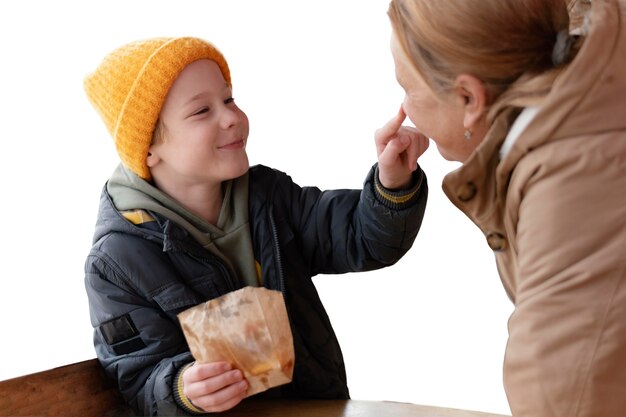 Little boy spending time outdoors with his grandmother