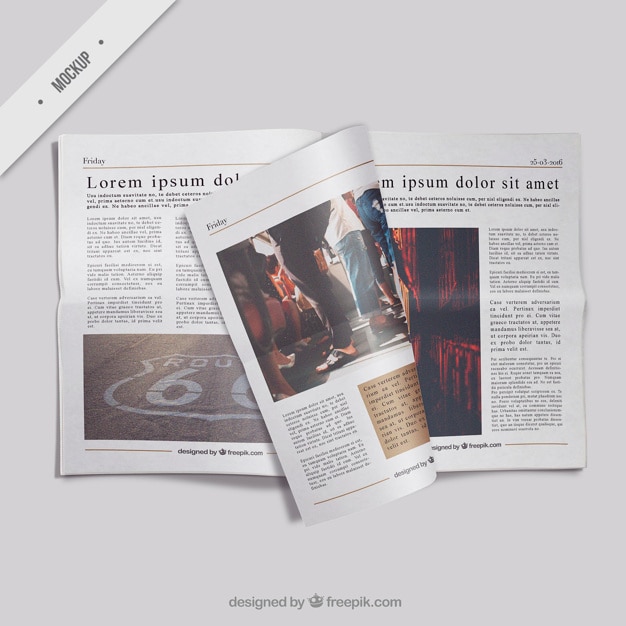 Free PSD open newspaper mockup with a folded page 