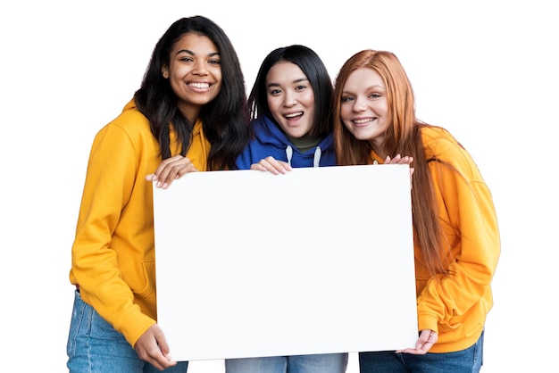 Free PSD portrait of young teenage girls with blank placard