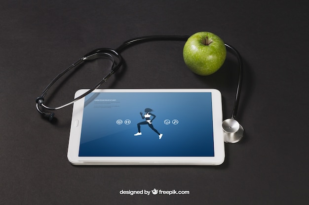 Free PSD tablet with sports app, apple and stethoscope