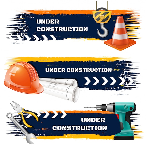 Under construction grunge banners with road barrier protective helmet hook of elevating crane realistic icons