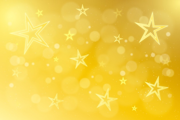 Free vector gradient yellow star background