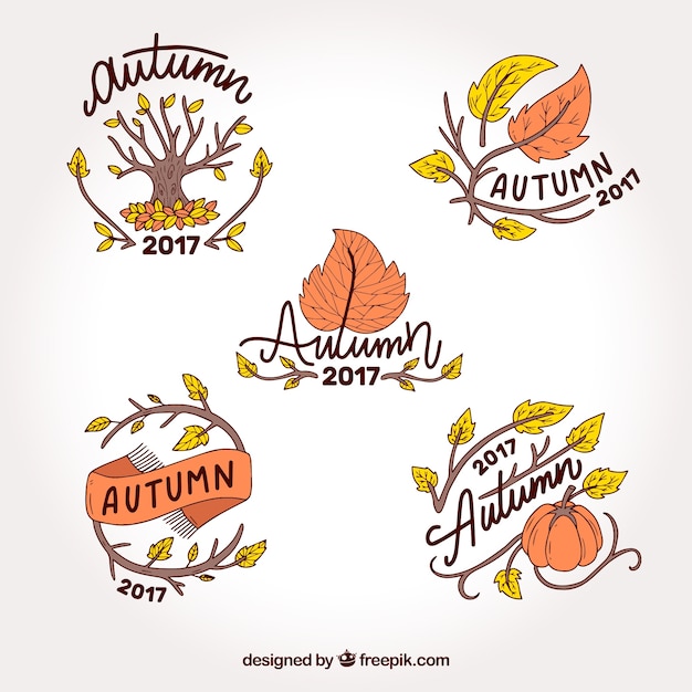 Free Vector hand drawn variety of autumn labels