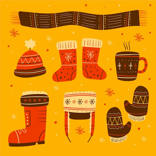 Free vector hand drawn winter clothes and essentials