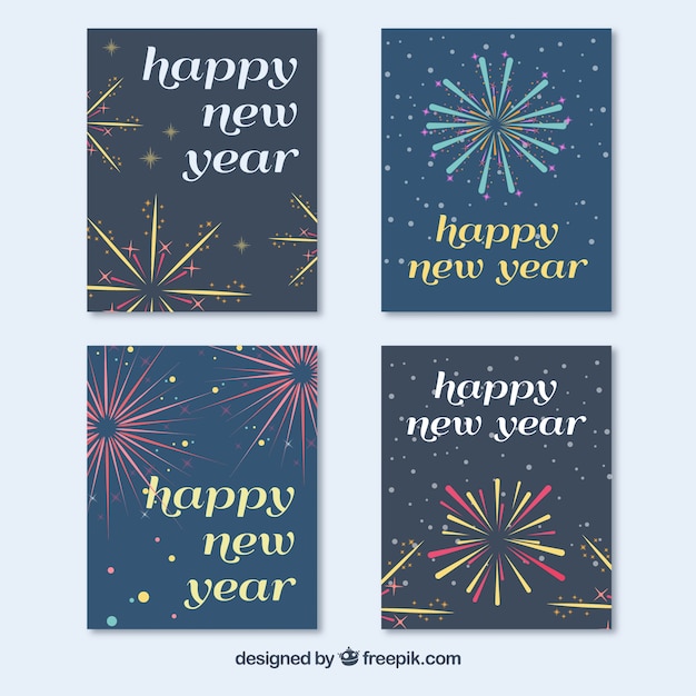 Free Vector happy new year cards with fireworks