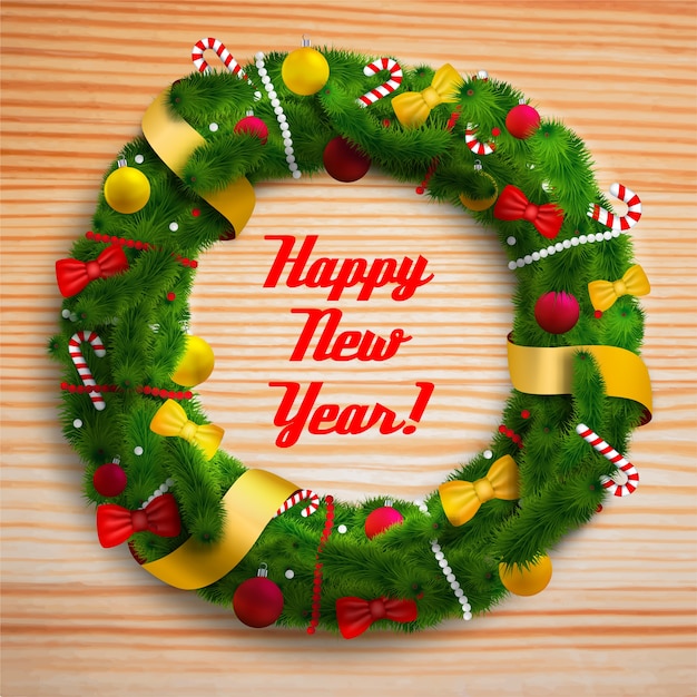 Free Vector happy new year decorated wreath on wooden table