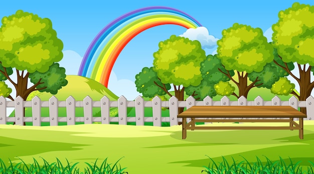 Free Vector park landscape scene with rainbow in the sky