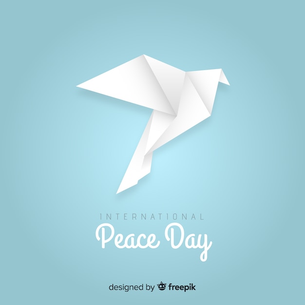 Free Vector peace day concept with origami dove