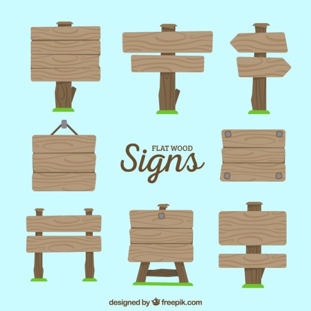 Free Vector set of wooden signs with grass in flat style