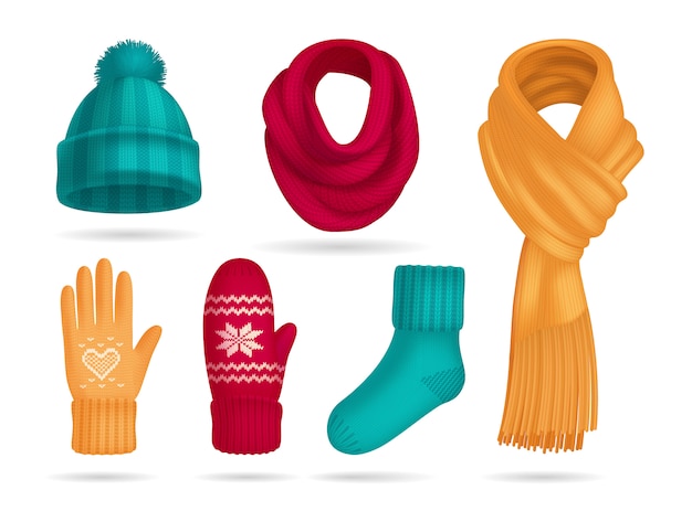 Free vector winter knitted accessories realistic set with hat and socks isolated