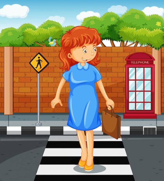 Woman crossing the road