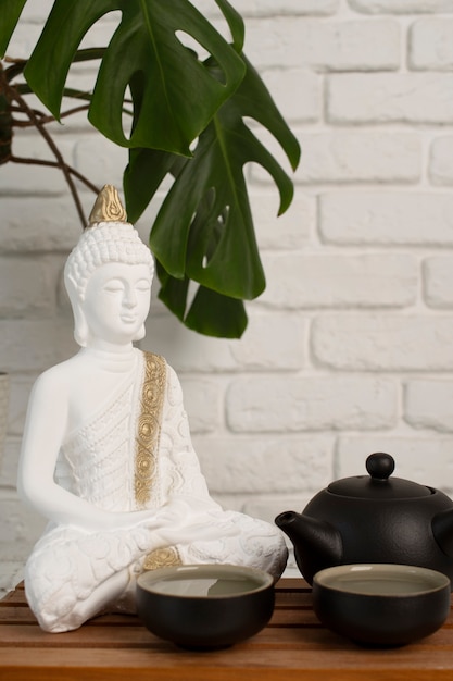 Photo gratuite figurine bouddha nature morte