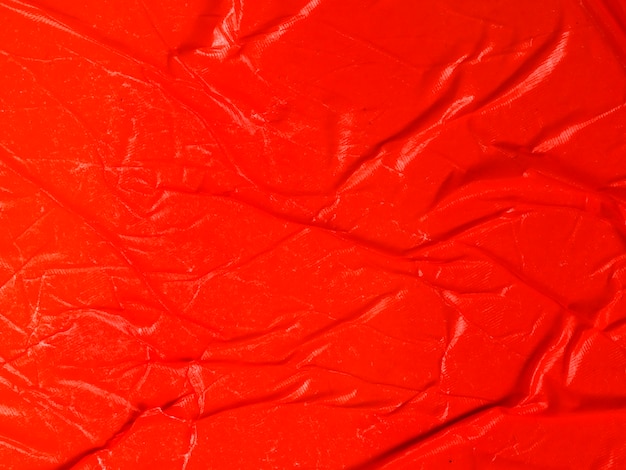 Fond de papier rouge froissé