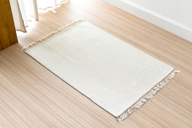 Photo gratuite fond de tapis tissé blanc sur le sol