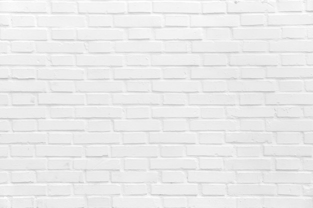 Photo gratuite mur de briques peintes en blanc