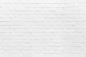 Photo gratuite mur de briques peintes en blanc