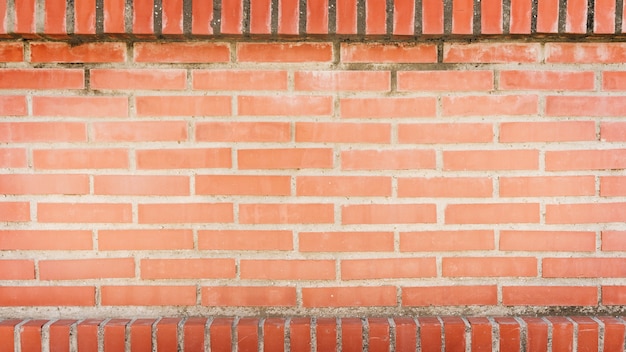 Photo gratuite plein cadre de mur de brique rouge