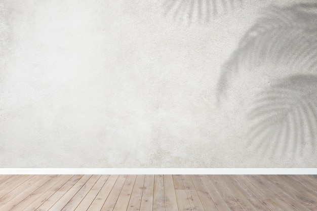 Photo gratuite salle vide avec mur gris et ombre tropicale