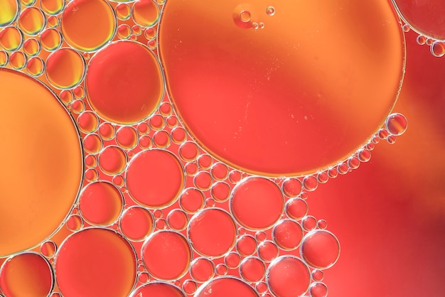 Photo gratuite texture de diverses bulles orange abstraites