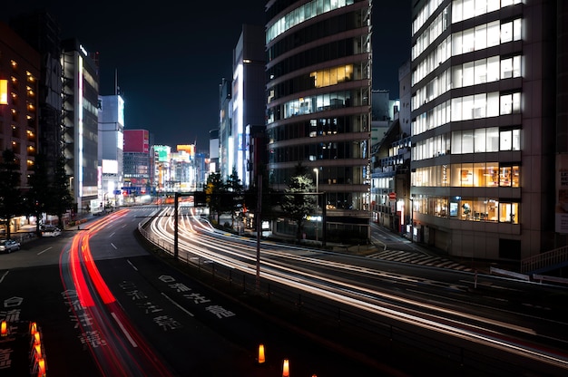 Photo gratuite la ville de la vie nocturne scintille de lumière