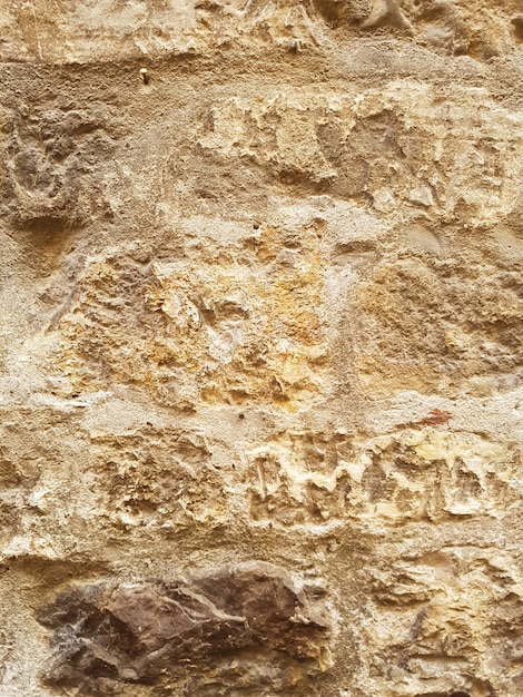 Détail de l'ancien mur jaune