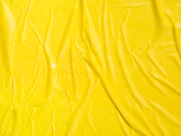 Fond de papier jaune froissé