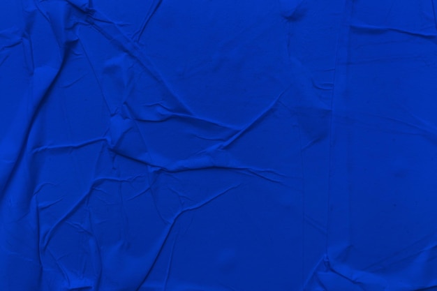 Le papier bleu vierge est un fond de texture froissé Arrière-plans de texture de papier froissé à diverses fins