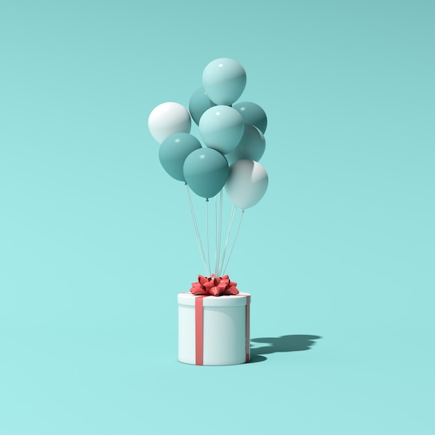 Rendu 3D d'une boîte-cadeau ronde et de ballons. Notion minimale.