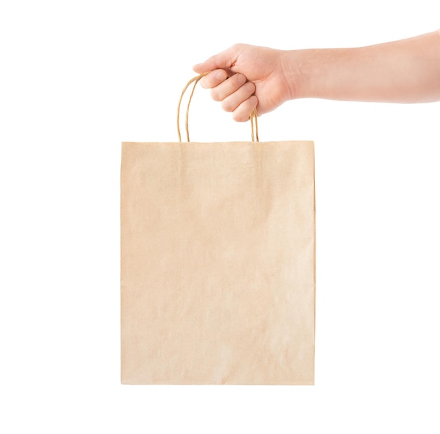 Sac à provisions en main humaine isolated on white