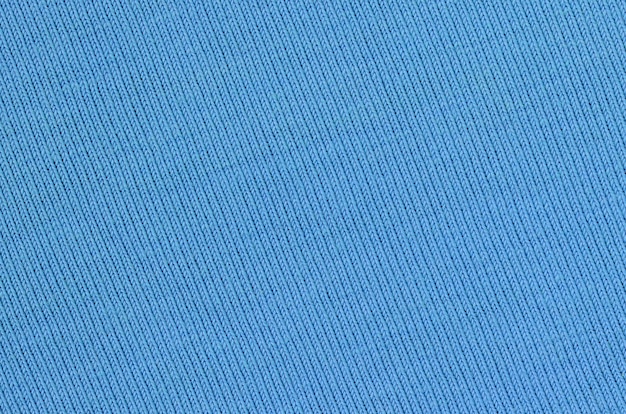 La texture du tissu sur fond bleu