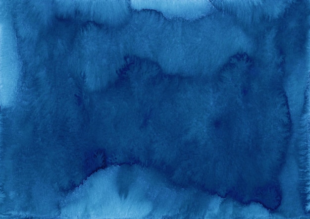 Texture de fond bleu foncé aquarelle. Taches bleu marine sur papier, peintes à la main.