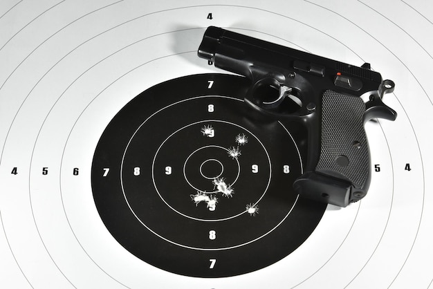 9 mm. semi automatic handgun and shooting target