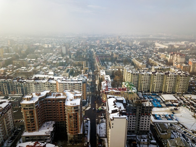 Aerial black and white winter top view of modern city