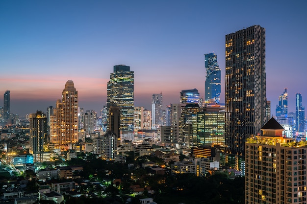 Aerial view  beautiful sunset  Bangkok city tower of Thailand cityscape at night