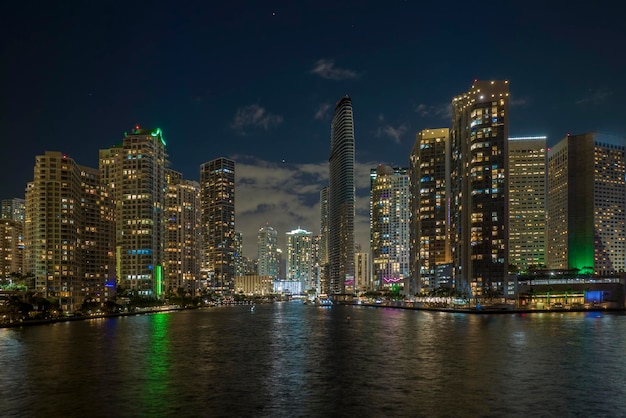 Aerial view of downtown district of of Miami Brickell in Florida USA Brightly illuminated high skyscraper buildings in modern american midtown