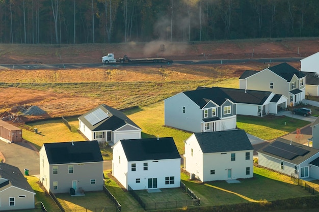 Aerial view of real estate development with tightly located family houses under construction in Carolinas suburban area Concept of growing american suburbs