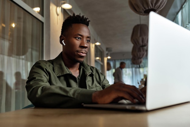 African american man using computer