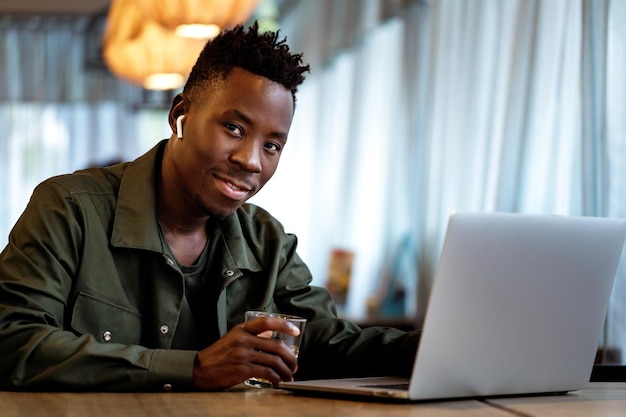 African american man using computer